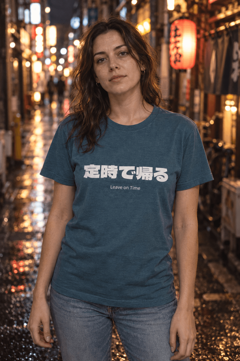 Woman wearing a denim-blue Leave on Time T-shirt