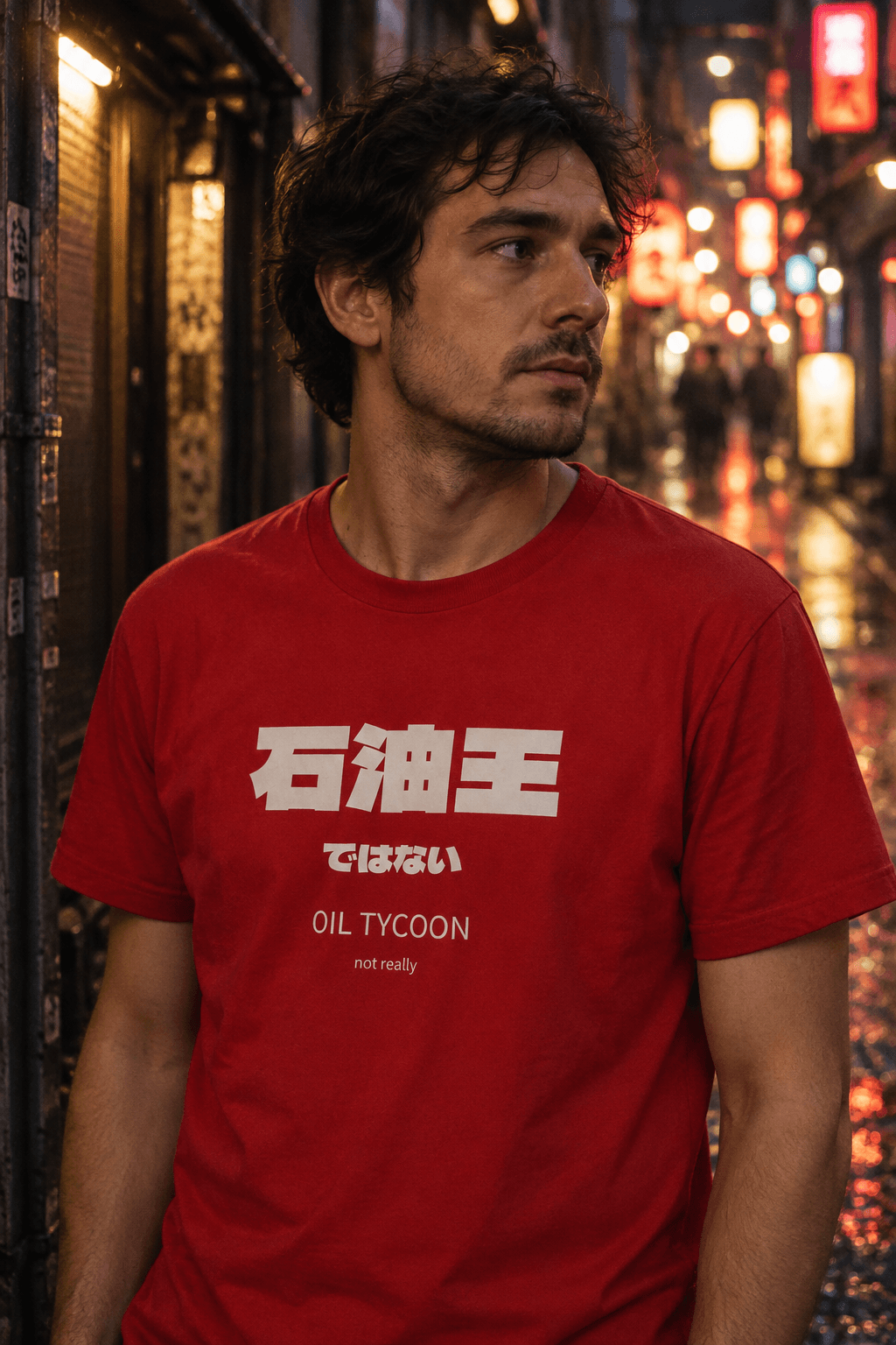 Man wearing a red Oil Tycoon — not really T-shirt